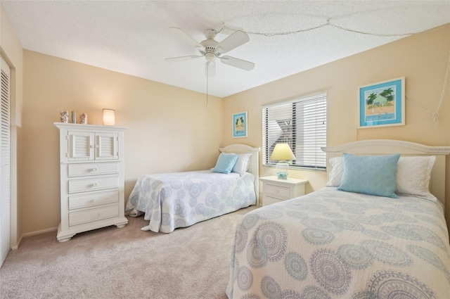 bedroom featuring ceiling fan and carpet floors