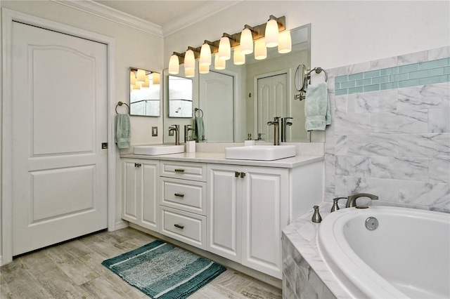 bathroom featuring double vanity, a bath, crown molding, and a sink