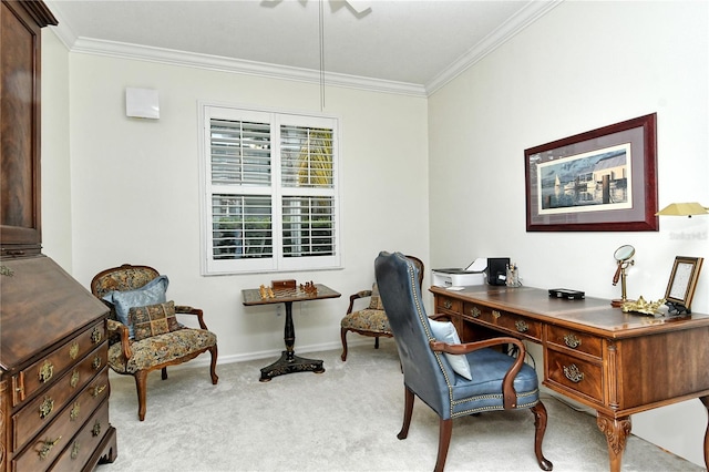 office space with crown molding, a ceiling fan, baseboards, and light carpet