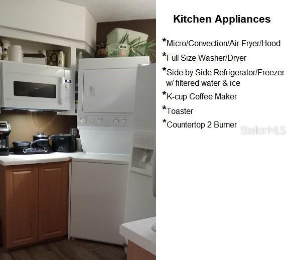 722 S Blvd Of The Presidents Unit 201, Sarasota, FL 34236 - kitchen featuring white microwave, stacked washer and clothes dryer, light countertops, and dark wood finished floors