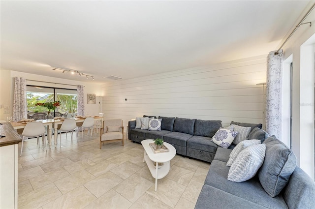 living room featuring wooden walls