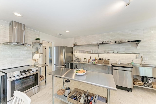 kitchen featuring visible vents, backsplash, wall chimney range hood, stainless steel appliances, and open shelves