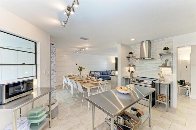 dining room featuring visible vents