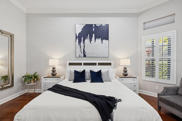 bedroom with baseboards, dark wood-style floors, and ornamental molding