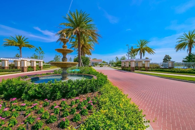 view of home's community with a pergola