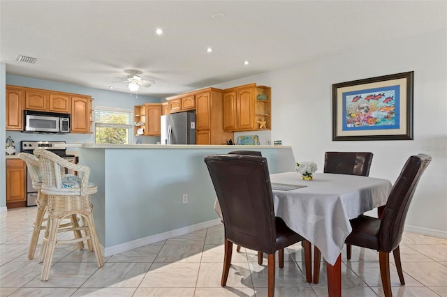 dining area with recessed lighting, baseboards, visible vents, and ceiling fan