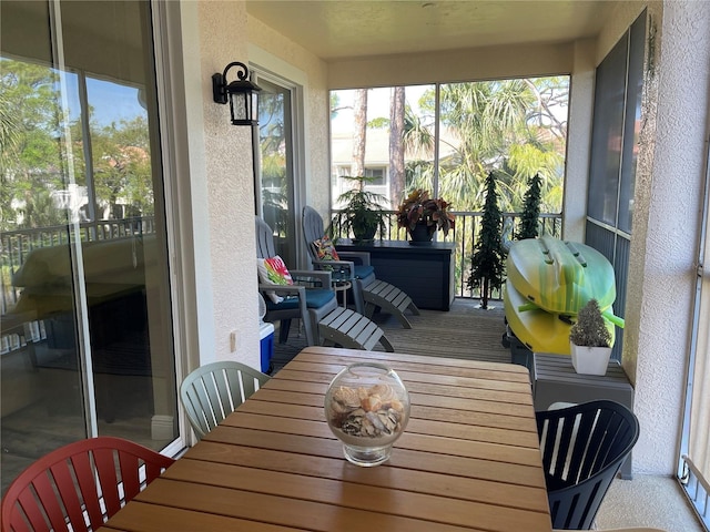 sunroom / solarium featuring plenty of natural light