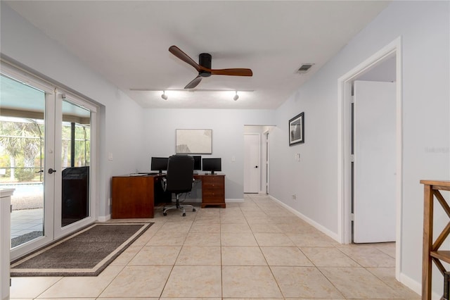 office area featuring baseboards, visible vents, light tile patterned flooring, ceiling fan, and french doors