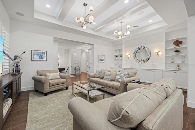 living area featuring built in shelves, beam ceiling, baseboards, a chandelier, and dark wood-style flooring