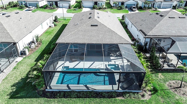 birds eye view of property with a residential view