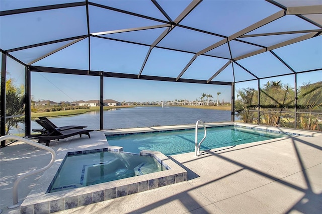 view of swimming pool featuring a water view, a pool with connected hot tub, a lanai, and a patio area