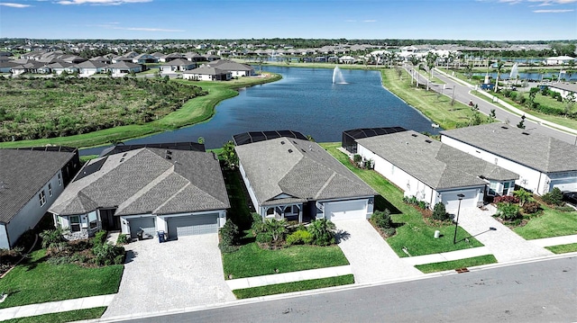 aerial view with a residential view and a water view