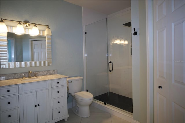 full bathroom with toilet, a stall shower, vanity, and tile patterned flooring