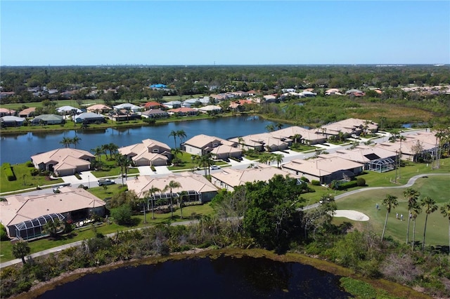 bird's eye view with a residential view and a water view