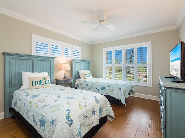 bedroom with multiple windows, crown molding, baseboards, and dark wood-style flooring