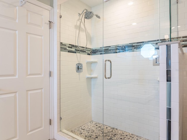 full bathroom with a shower stall