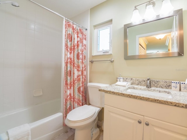 bathroom with vanity, toilet, and shower / tub combo