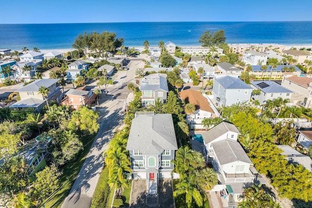 birds eye view of property featuring a residential view and a water view