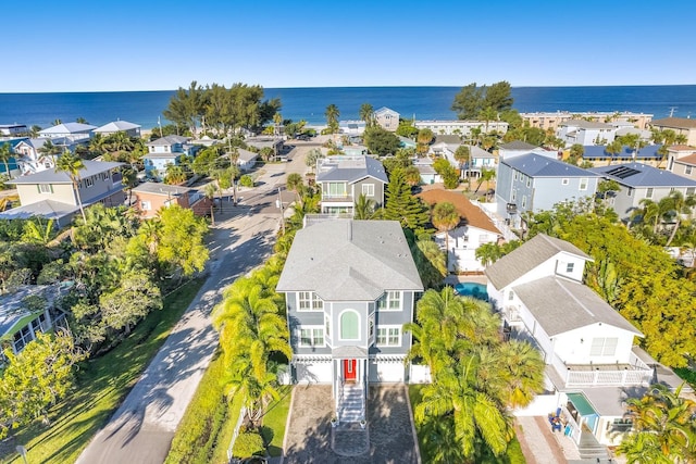 aerial view with a residential view and a water view