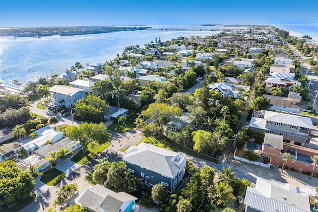 aerial view with a water view and a residential view