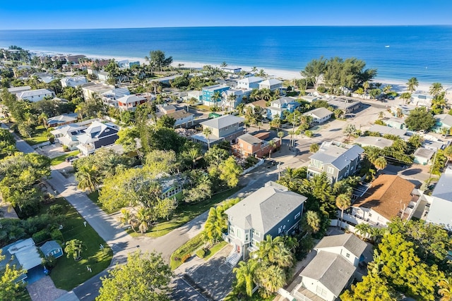 drone / aerial view featuring a residential view and a water view