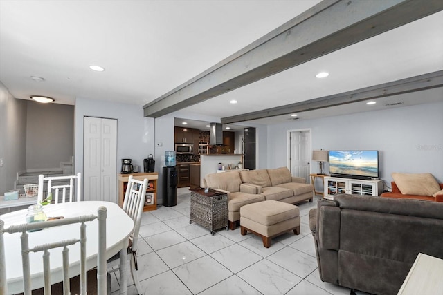 living room featuring visible vents, beamed ceiling, recessed lighting, and marble finish floor