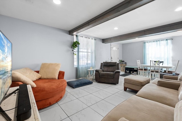 living area with recessed lighting, beam ceiling, and marble finish floor