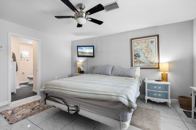 bedroom with visible vents, marble finish floor, ensuite bathroom, and baseboards