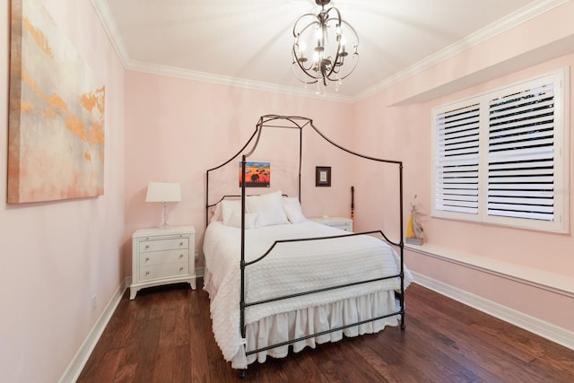 bedroom with a notable chandelier, crown molding, baseboards, and wood finished floors