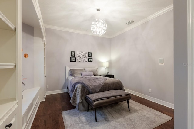 bedroom with visible vents, an inviting chandelier, dark wood-style flooring, and crown molding