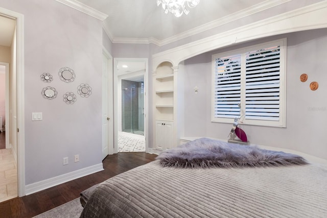 bedroom featuring baseboards, an inviting chandelier, wood finished floors, and ornamental molding