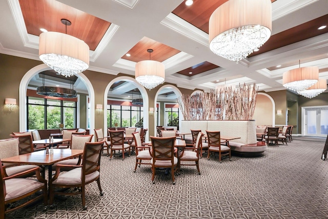 dining area with crown molding, carpet, a chandelier, beam ceiling, and coffered ceiling