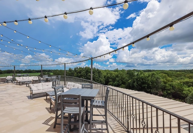 view of patio with outdoor dining space and outdoor lounge area