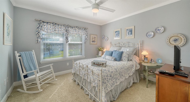 bedroom with baseboards, light carpet, ceiling fan, and crown molding