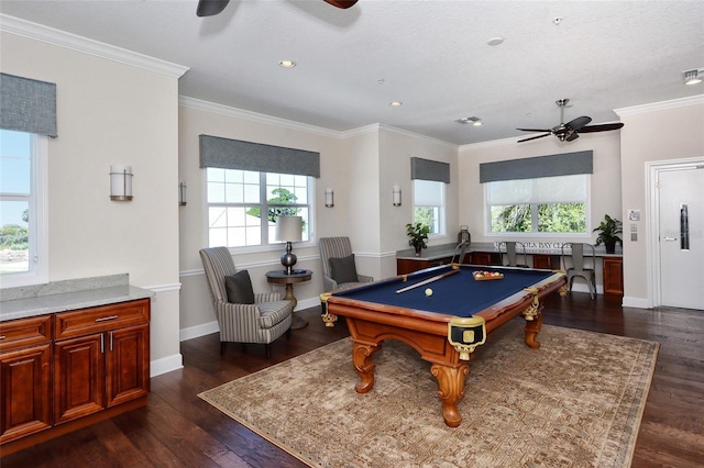 playroom with ornamental molding, billiards, ceiling fan, and dark wood-style flooring