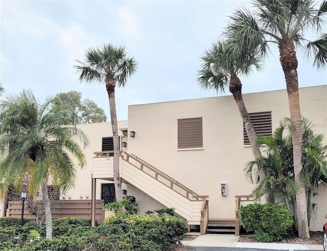 view of building exterior featuring stairs