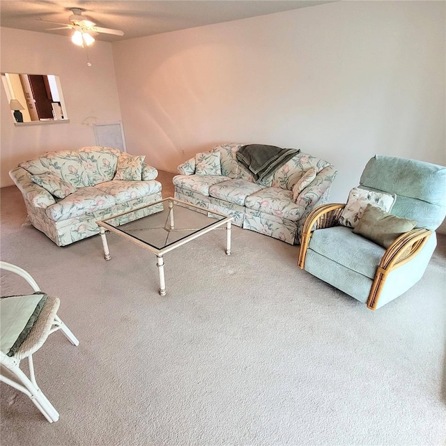 carpeted living room featuring ceiling fan