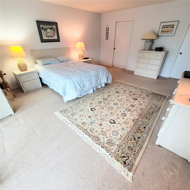 bedroom featuring carpet