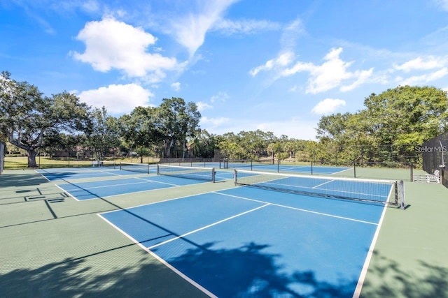 view of sport court with community basketball court and fence