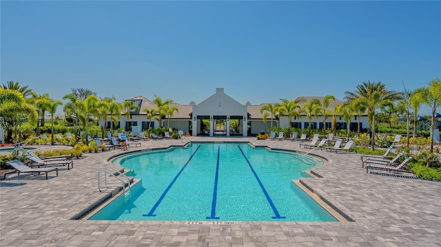 pool with a patio area