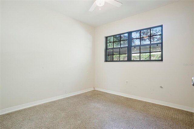 124 E 119th Ave, Tampa, FL 33612 - unfurnished room with baseboards and ceiling fan