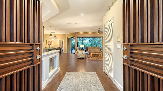 entryway featuring recessed lighting, a ceiling fan, and dark wood-style flooring