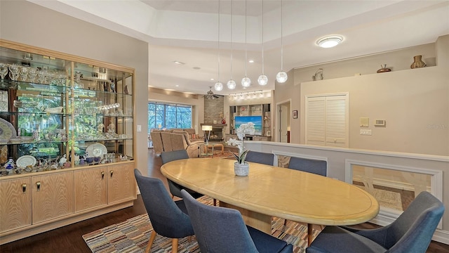 dining area with dark wood finished floors