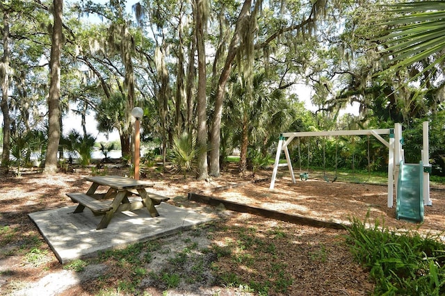 exterior space featuring playground community