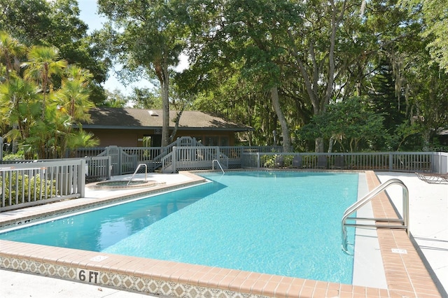 community pool with fence