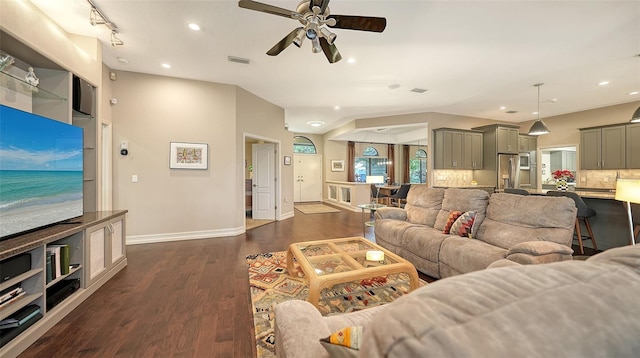 living room with visible vents, baseboards, recessed lighting, dark wood-style floors, and a ceiling fan