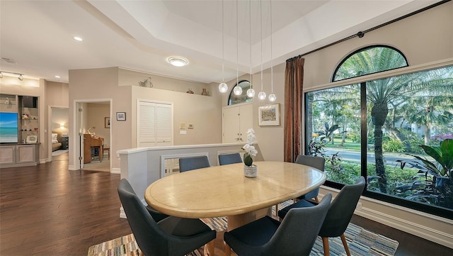 dining room with recessed lighting, baseboards, and dark wood-style flooring