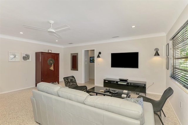 living room featuring recessed lighting, baseboards, and a ceiling fan