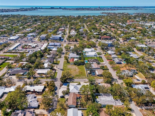 bird's eye view featuring a residential view and a water view