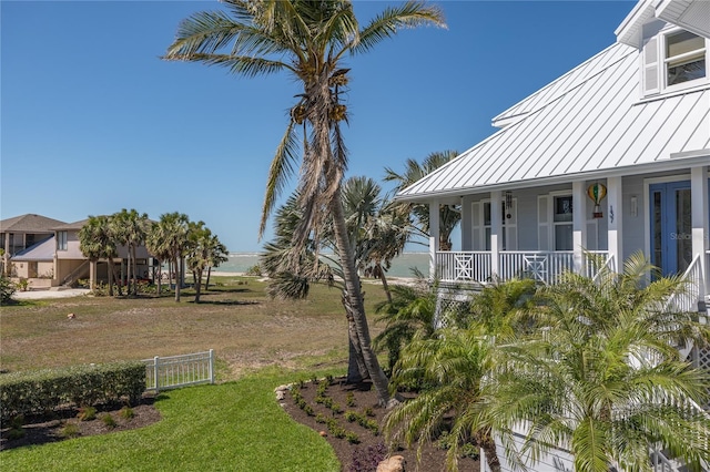 137 Big Pass Ln, Sarasota, FL 34242 - view of yard featuring covered porch